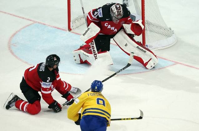 Ice hockey Eishockey - IIHF Ice Hockey WC 2015 PRAGUE,CZECH REPUBLIC,06.MAY.15 - ICE HOCKEY - IIHF World Ice Hockey Championships, international match Länderspiel Sweden vs Canada. Image shows Dan Hamhuis, Mike Smith (CAN) and Filip Forsberg (SWE). GEPAxpictures xAndreasxPranter 