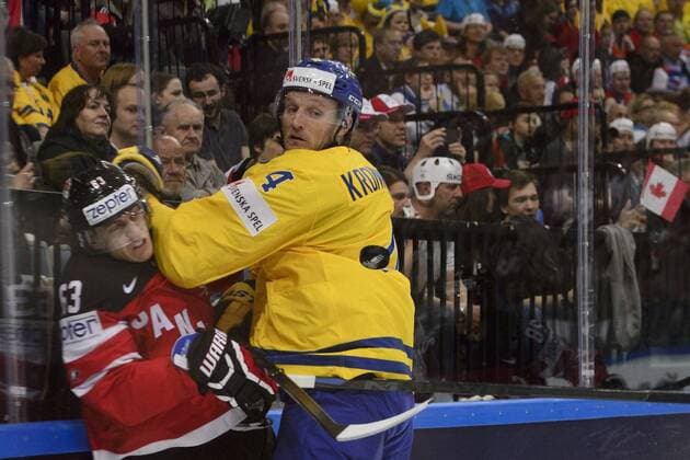 Tyler Ennis (CAN), left, and Staffan Kronwall (SWE) in action during the Ice hockey Eishockey World Championship WM Weltmeisterschaft Group A match Sweden vs Canada in Prague, Czech Republic, May 6, 2015. (CTKxPhoto MichalxKamaryt) CTKPhotoP201505060921001  kmt 1