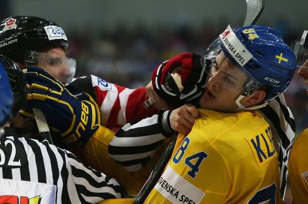 Ice hockey Eishockey - IIHF Ice Hockey WC 2015 PRAGUE,CZECH REPUBLIC,06.MAY.15 - ICE HOCKEY - IIHF World Ice Hockey Championships, international match Länderspiel Sweden vs Canada. Image shows Oscar Klefbom (SWE). Keywords: fight. GEPAxpictures xAndreasxPranter 