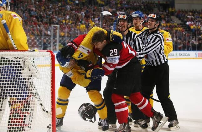 Ice hockey Eishockey - IIHF Ice Hockey WC 2015 PRAGUE,CZECH REPUBLIC,06.MAY.15 - ICE HOCKEY - IIHF World Ice Hockey Championships, international match Länderspiel Sweden vs Canada. Image shows Staffan Kronwall (SWE) and Nathan Mackinnon (CAN). Keywords: fight. GEPAxpictures xAndreasxPranter 