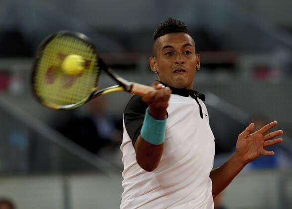 May 6, 2014 - Madrid, Spain - Spain, Madrid : Australian tennis player Nick Kyrgios returns the ball to Swiss tennis player Roger Federer during the Madrid ATP Tennis Herren Masters Series Tournament tennis match, day 6 on May 6, 2015 in Madrid Open Madrid Tennis, Federer Vs Nick Kyrgios  - ZUMAn230