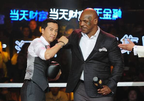 Hong Kong actor Donnie Yen, left, interacts with retired American boxer Mike Tyson during a press conference PK Pressekonferenz for their movie IP MAN 3 in Shanghai, China, 6 May 2015. Donnie Yen, Mike Tyson heat up press conference for movie IP MAN 3 in Shanghai  pbu270017_03
