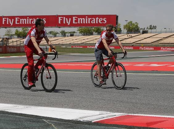 May 7, 2015 - Barcelona, Spain - SEBASTIAN VETTEL of Germany and Scuderia Ferrari is seen riding a bicycle on the track during preparations to the 2015 Formula 1 Spanish Grand Prix at Circuit de Catalunya in Barcelona, Spain. F1 2015 - Spanish Grand Prix - Preparations - ZUMAg147