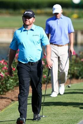 May 7, 2015 - Ponte Vedra Beach, Florida, United States - J. B. Holmes (L) walks up the 17th hole during the first round of THE PLAYERS Championship. THE PLAYERS Championship - Round 1 - ZUMAw109
