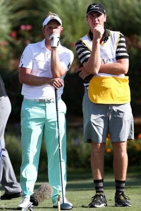 May 7, 2015 - Ponte Vedra Beach, Florida, United States - Luke Donald (L) and his caddie stare at the 18th fairway during the first round of THE PLAYERS Championship. THE PLAYERS Championship - Round 1 - ZUMAw109