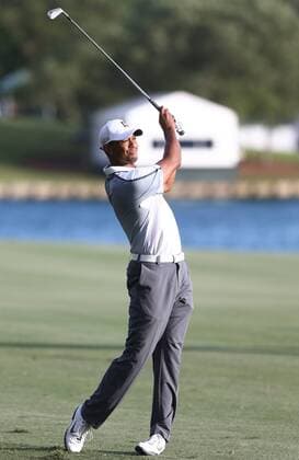 May 7, 2015 - Ponte Vedra Beach, Florida, United States - Tiger Woods hits a fairway shot on the 18th hole during the first round of THE PLAYERS Championship. THE PLAYERS Championship - Round 1 - ZUMAw109