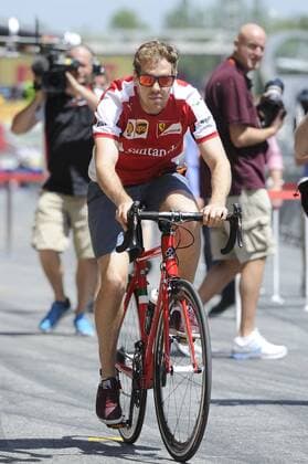 Aktuell Motorsport, Formel 1, GP Barcelona, Sebastian Vettel erkundet die Strecke mit dem Fahrrad Sebastian VETTEL,GER (Scuderia Ferrari) faehrt mit dem Rennrad aus der Ferrari Box zur Streckenbesichtigung. Formel 1:GP von Spanien,Circuit de Catalunya,Saison2015,am 07.05.2015.