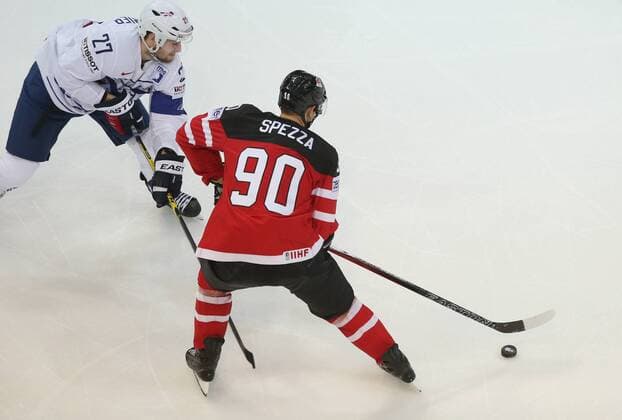 Ice hockey Eishockey - IIHF Ice Hockey WC 2015 PRAGUE,CZECH REPUBLIC,09.MAY.15 - ICE HOCKEY - IIHF World Ice Hockey Championships, international match Länderspiel France vs Canada. Image shows Loic Lamperier (FRA) and Jason Spezza (CAN). GEPAxpictures xAndreasxPranter 