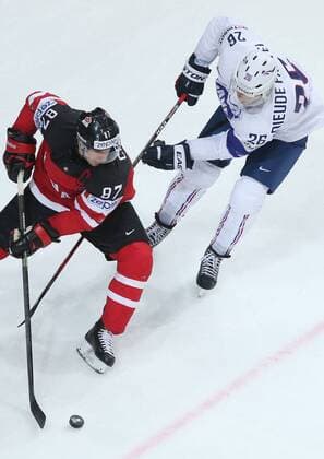 Ice hockey Eishockey - IIHF Ice Hockey WC 2015 PRAGUE,CZECH REPUBLIC,09.MAY.15 - ICE HOCKEY - IIHF World Ice Hockey Championships, international match Länderspiel France vs Canada. Image shows Sidney Crosby (CAN) and Benjamin Dieude FAUVEL. GEPAxpictures xAndreasxPranter 