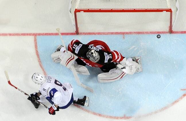 Damien Fleury (FRA) shoots a gol to goalkeeper Martin Jones (CAN) during the Ice hockey Eishockey World Championship WM Weltmeisterschaft Group A match France vs Canada in Prague, Czech Republic, May 9, 2015. (CTKxPhoto MichalxKamaryt) CTKPhotoP201505090313101  kmt 18