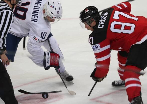 Ice hockey Eishockey - IIHF Ice Hockey WC 2015 PRAGUE,CZECH REPUBLIC,09.MAY.15 - ICE HOCKEY - IIHF World Ice Hockey Championships, international match Länderspiel France vs Canada. Image shows Laurent Meunier (FRA) and Sidney Crosby (CAN). GEPAxpictures xAndreasxPranter 
