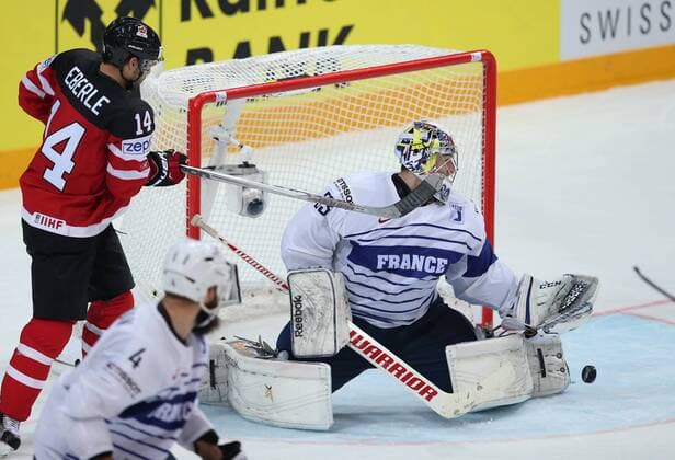 Ice hockey Eishockey - IIHF Ice Hockey WC 2015 PRAGUE,CZECH REPUBLIC,09.MAY.15 - ICE HOCKEY - IIHF World Ice Hockey Championships, international match Länderspiel France vs Canada. Image shows Jordan Eberle (CAN), Ronan Quemener and Antonin Manavian (FRA). GEPAxpictures xAndreasxPranter 
