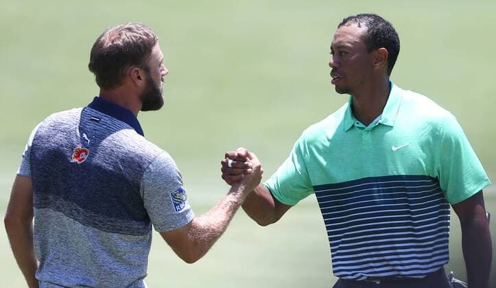 Aktuell Golf - The Players Championship in Ponte Vedra Beach May 9, 2015 - Ponte Vedra Beach, Florida, United States - Tiger Woods (R) shakes hands with Graham DeLaet on the 18th green after the third round of THE PLAYERS Championship. THE PLAYERS Championship - Round 3 - ZUMAw109