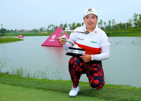 SHANGHAI, CHINA - MAY 10: (CHINA OUT) Feng Shanshan competes in a cotest and wins the championship during day four of 2015 Buick Golf Championship at Shanghai Qizhong Garden Golf Club on May 10, 2015 in Shanghai, China.  CFP467298713 