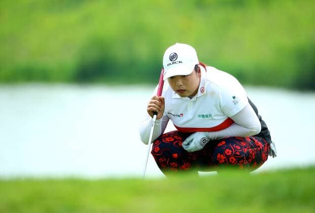 SHANGHAI, CHINA - MAY 10: (CHINA OUT) Feng Shanshan competes in a cotest and wins the championship during day four of 2015 Buick Golf Championship at Shanghai Qizhong Garden Golf Club on May 10, 2015 in Shanghai, China.  CFP467298717 