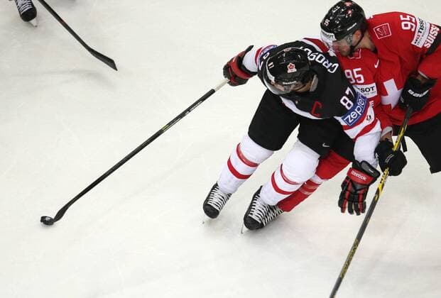 Ice hockey Eishockey - IIHF Ice Hockey WC 2015 PRAGUE,CZECH REPUBLIC,10.MAY.15 - ICE HOCKEY - IIHF World Ice Hockey Championships, international match Länderspiel Switzerland vs Canada. Image shows Sidney Crosby (CAN) and Julian Walker (SUI). GEPAxpictures xAndreasxPranter 