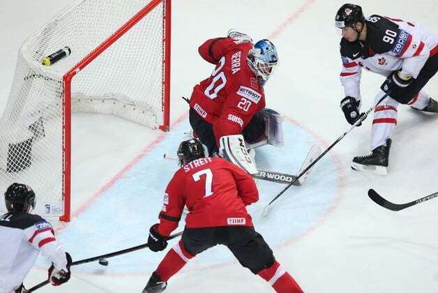 Ice hockey Eishockey - IIHF Ice Hockey WC 2015 PRAGUE,CZECH REPUBLIC,10.MAY.15 - ICE HOCKEY - IIHF World Ice Hockey Championships, international match Länderspiel Switzerland vs Canada. Image shows Taylor Hall (CAN), Mark Streit, Reto Berra (SUI) and Jason Spezza (CAN). GEPAxpictures xAndreasxPranter 