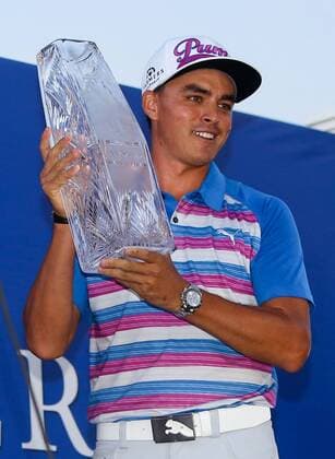 May 10, 2015 - Ponte Vedra Beach, Florida, United States - Rickie Fowler holds the trophy after winning the sudden death playoff round of THE PLAYERS Championship. THE PLAYERS Championship - Final Round - ZUMAw109