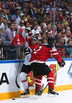 Ice hockey Eishockey - IIHF Ice Hockey WC 2015 PRAGUE,CZECH REPUBLIC,12.MAY.15 - ICE HOCKEY - IIHF World Ice Hockey Championships, international match Länderspiel Canada vs Austria. Image shows Dan Hamhuis (CAN) and Mario Fischer (AUT). GEPAxpictures xAndreasxPranter 