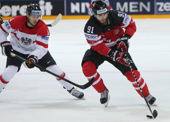 Ice hockey Eishockey - IIHF Ice Hockey WC 2015 PRAGUE,CZECH REPUBLIC,12.MAY.15 - ICE HOCKEY - IIHF World Ice Hockey Championships, international match Länderspiel Canada vs Austria. Image shows Daniel Mitterdorfer (AUT) and Tyler Sguin (CAN). GEPAxpictures xAndreasxPranter 