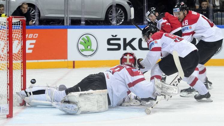 Left to right: goalkeeper Bernhard Starkbaum and Alexander Cijan (both AUT), Matt Duchene (CAN) and Florian Iberer (AUT) in action during their Hockey World Championships Group A match Canada vs Austria in Prague, Czech Republic, May 12, 2015. (CTKxPhoto MichalxKamaryt) CTKPhotoP201505120486501  kmt 1