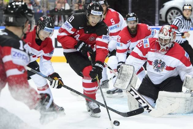 Left to right: Jordan Eberle (CAN), Daniel Mitterdorfer (AUT), Brayden Schenn (CAN) and Thomas Raffl, Martin Schumnig and goalkeeper Bernhard Starkbaum (all AUT) in action during their Hockey World Championships Group A match Canada vs Austria in Prague, Czech Republic, May 12, 2015. (CTKxPhoto MichalxKamaryt) CTKPhotoP201505120571101  kmt 9