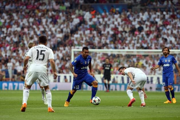 May 13, 2015 - Madrid, Spain - CARLOS TEVEZ of Juventus in action during the UEFA Champions League semi final second leg match between Real Madrid CF and Juventus at the Santiago Bernabeu stadium in Madrid, Spain. UEFA Champions League 2015 - Real Madrid CF v Juventus - ZUMAg147