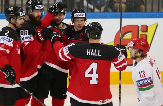 Ice hockey Eishockey - IIHF Ice Hockey WC 2015 PRAGUE,CZECH REPUBLIC,14.MAY.15 - ICE HOCKEY - IIHF World Ice Hockey Championships, international match Länderspiel quarterfinal, Canada vs Belarus. Image shows the rejoicing of Dan Hamhuis, Brent Burns, Jordan Eberle, Sidney Crosby, Taylor Hall (CAN) and the disappointment of Sergei Drozd (BLR). GEPAxpictures xAndreasxPranter 