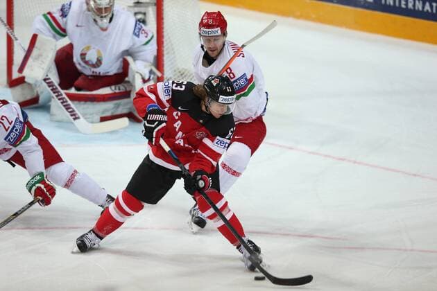 Ice hockey Eishockey - IIHF Ice Hockey WC 2015 PRAGUE,CZECH REPUBLIC,14.MAY.15 - ICE HOCKEY - IIHF World Ice Hockey Championships, international match Länderspiel quarterfinal, Canada vs Belarus. Image shows Kevin Lalande (BLR), Tyler Ennis (CAN) and Ilya Shinkevich (BLR). GEPAxpictures xAndreasxPranter 