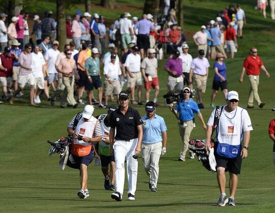 May 15, 2015 - Charlotte, NC, USA - Webb Simpson, center, walks up the 18th fairway during the second round of the Wells Fargo Championship at Quail Hollow Club on Friday, May 15, 2015, in Charlotte, N.C. Wells Fargo Second Round - ZUMAm67_