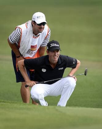 May 15, 2015 - Charlotte, NC, USA - Webb Simpson and his caddie line up a putt on the 14th green during the second round of the Wells Fargo Championship at Quail Hollow Club on Friday, May 15, 2015, in Charlotte, N.C. Wells Fargo Second Round - ZUMAm67_