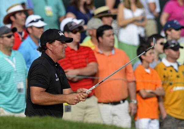 May 15, 2015 - Charlotte, NC, USA - Phil Mickelson watches his ball roll across the 18th green after chipping from a sand trap during the second round of the Wells Fargo Championship at Quail Hollow Club on Friday, May 15, 2015, in Charlotte, N.C. Wells Fargo Second Round - ZUMAm67_