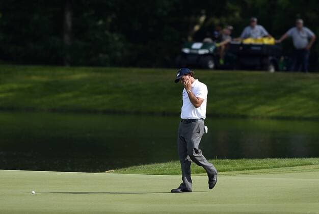 May 16, 2015 - Charlotte, NC, USA - Phil Mickelson reacts to a missed putt on the 17th green during the third round of the Wells Fargo Championship on Saturday, May 16, 2015, at Quail Hollow Club in Charlotte, N.C. Wells Fargo Championship - ZUMAm67_