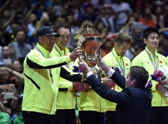 (150517) -- DONGGUAN, May 17, 2015 -- China s head coach Li Yongbo(L) accepts the Sudirman Cup during the awarding ceremony for 2015 Sudirman Cup BWF World Mixed Team Championships in Dongguan, south China s Guangdong Province, May 17, 2015. ) (SP)CHINA-DONGGUAN-BADMINTON-2015 SUDIRMAN CUP(CN) LiuxDawei 