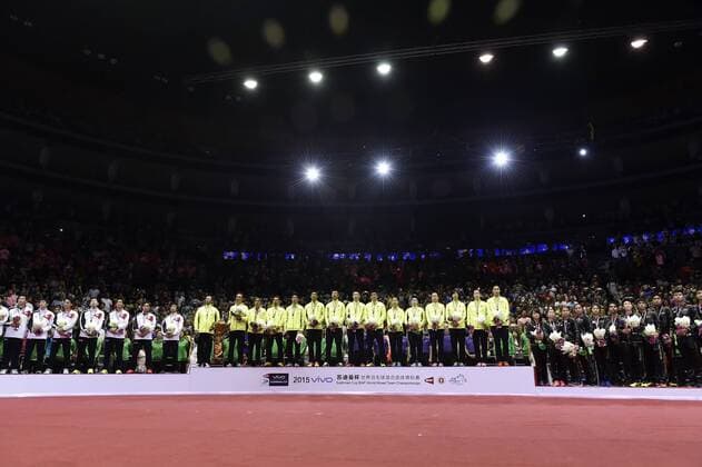 (150517) -- DONGGUAN, May 17, 2015 -- Team of Japan(L),Team of China(C) and Players of South Korea celebrate during the awarding ceremony after the final of 2015 Sudirman Cup BWF World Mixed Team Championships in Dongguan, south China s Guangdong Province, May 17, 2015. ) (SP)CHINA-DONGGUAN-BADMINTON-2015 SUDIRMAN CUP(CN) LiangxXu 