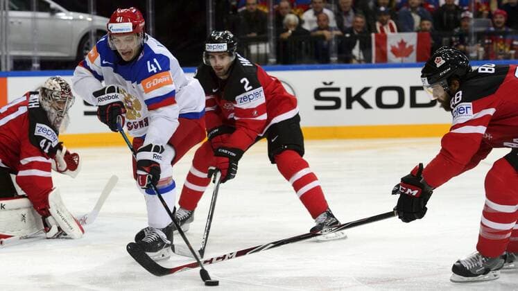 From left goalkeeper Mike Smith (CAN), Nikolai Kulyomin (RUS), Dan Hamhuis (CAN) and Brent Burns (CAN) in action during the Ice hockey Eishockey World Championships final duel for gold medal Canada vs Russia in Prague, Czech Republic, May 17, 2015. (CTKxPhoto MichalxKamaryt) CTKPhotoP201505170601701  kmt 1