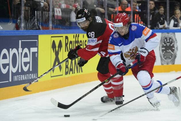 From left Canadian defender Brent Burns and Russian forward Artemi Panarin fight for puck during the Ice hockey Eishockey World Championships final duel for gold medal Canada vs Russia in Prague, Czech Republic, May 17, 2015. (CTKxPhoto MichalxKamaryt) CTKPhotoP201505170617901  kmt 3
