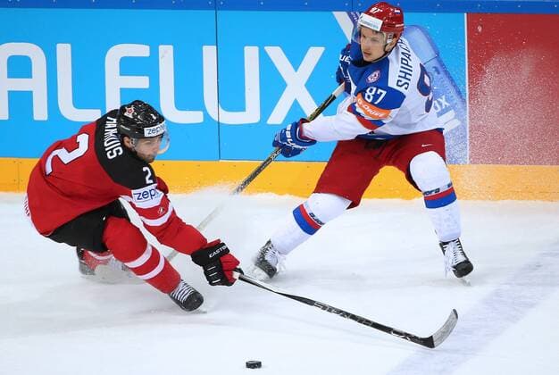 PRAGUE, CZECH REPUBLIC. MAY 17, 2015. Canada s Dan Hamhuis (L) and Russia s Vadim Shipachyov fight for the puck in their 2015 IIHF Ice hockey Eishockey World Championship WM Weltmeisterschaft final match at O2 Arena. Valery Sharifulin TASS  TS003811
