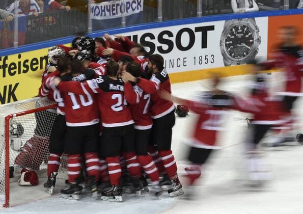 Canadian players celebrate their victory of the Ice hockey Eishockey World Championship WM Weltmeisterschaft after the final duel for gold medal Canada vs Russia in Prague, Czech Republic, May 17, 2015. (CTKxPhoto RomanxVondrous) CTKPhotoP201505170703101  vnd 1