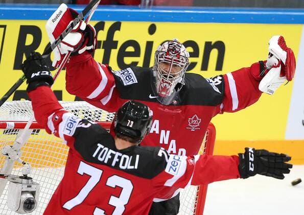 PRAGUE, CZECH REPUBLIC. MAY 17, 2015. Canada s Tyler Toffoli (L) and goalie Mike Smith celebrate winning the 2015 IIHF Ice hockey Eishockey World Championship WM Weltmeisterschaft final match against Russia at O2 Arena. The Canadian team won the game 6:1 and claimed the world title. Valery Sharifulin TASS  TS003836