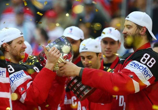 PRAGUE, CZECH REPUBLIC. MAY 17, 2015. Canada s defenceman Brent Burns (R) holds the trophy during the victory ceremony after winning the 2015 IIHF Ice hockey Eishockey World Championship WM Weltmeisterschaft final match against Russia at O2 Arena. The Canadian team won the game 6:1 and claimed the world title. Yelena Rusko TASS  TS003846