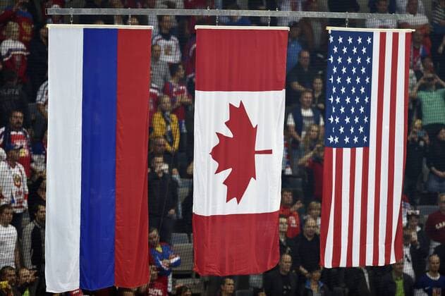 Canadian team won the Ice hockey Eishockey World Championship WM Weltmeisterschaft final match Canada vs Russia in Prague, Czech Republic, May 17, 2015. On the photo national flags, left to right, second placed Russia, winner Canada and third placed USA. (CTKxPhoto RomanxVondrous) CTKPhotoP201505180037801  vnd 1