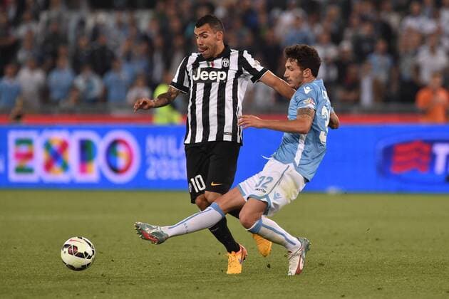 20.05.2015. Rome, Italy. TIM Coppa Italia Final. Lazio versus Juventus. Carlos Tevez and Marco Parolo fight for the ball xGiuseppexMaffiax  ActionPlus11622422