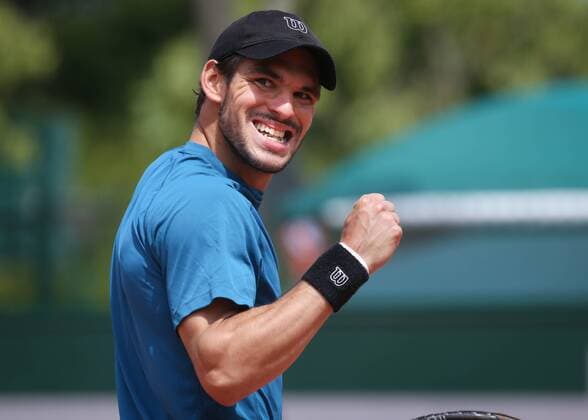 - PARIS, FRANCE: Belgian player Germain Gigounon celebrates during the tennis match between Belgian Germain Gigounon and Russian Alexander Kudryavtsev, in the second qualification round for the men s singles tournament at the Roland Garros tennis tournament in Paris, France, Thursday 21 May 2015. The qualifications games started already as Roland Garros Grand Slam takes place from 24 May to 07 June 2015. VIRGINIExLEFOUR  x04626736x