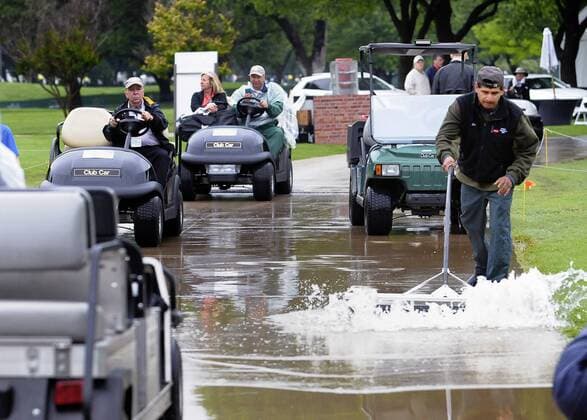 May 21, 2015 - Fort Worth, TX, USA - Crews work to remove standing water along the 1st hole during the rain delay at the first round at the Crowne Plaza Invitational at Colonial on May 21, 2015 in Fort Worth, Texas. Crowne Plaza Invitational golf - ZUMAm67_