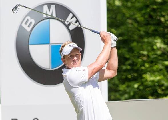 Golf - 2015 Wentworth BMW PGA Golf Herren Championship - First Round. Luke Donald with an iron from the tee at Wentworth Golf Club COLORSPORT DANIEL BEARHAM  BMW_PGA