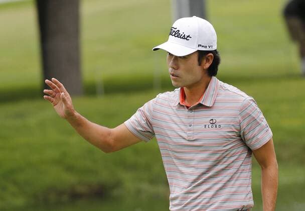 May 21, 2015 - Fort Worth, TX, USA - Kevin Na waves to crowd after hitting a birdie putt on the 9th hole during the first round at the Crowne Plaza Invitational at Colonial on Thursday, May 21, 2015, in Fort Worth, Texas. Crowne Plaza Invitational golf - ZUMAm67_