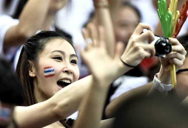 (150522) -- TIANJIN, May 22, 2015 -- A fan of Thailand takes photos during a Group B match between Thailand and Sri Lanka at the 18th Asian Senior Women s Volleyball Championships in Tianjin, north China, on May 22, 2015. Thailand won by 3-0. ) (SP)CHINA-TIANJIN-VOLLEYBALL-ASIAN SENIOR WOMEN S CHAMPIONSHIPS YuexYuewei 