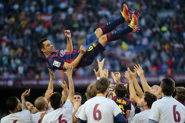 (150524) -- BARCELONA, Barcelona s captain Xavi Hernandez is tossed by his teammates after the Spanish BBVA La Liga (first division soccer league) match bwtween FC Barcelona Barca and RC Deportivo La Coruna at Camp Nou stadium in Barcelona, Spain, May 23, 2015. Xavi announced on Thursday his retirement from Barcelona at the end of the current season. He will play next season at Al Sadd in Qatar.)(wll) (SP)SPAIN-BARCELONA-SOCCER-LA LIGA PauxBarrena 