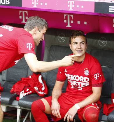 SOCCER - 1. DFL, Bayern vs Mainz MUNICH,GERMANY,23.MAY.15 - SOCCER - 1. DFL, 1. Deutsche Bundesliga, FC Bayern Muenchen vs 1. FSV Mainz 05. Image shows Thomas Mueller and Mario Goetze (Bayern). GEPA xFelixxRoittner